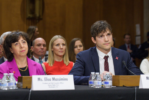 Elisa Massimino and Ashton Kutcher at a Congressional Hearing.