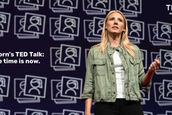 Julie Cordua on stage giving a TED Talk