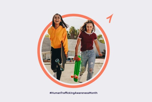 Two young girls with skateboards surrounded by Thorn branding.