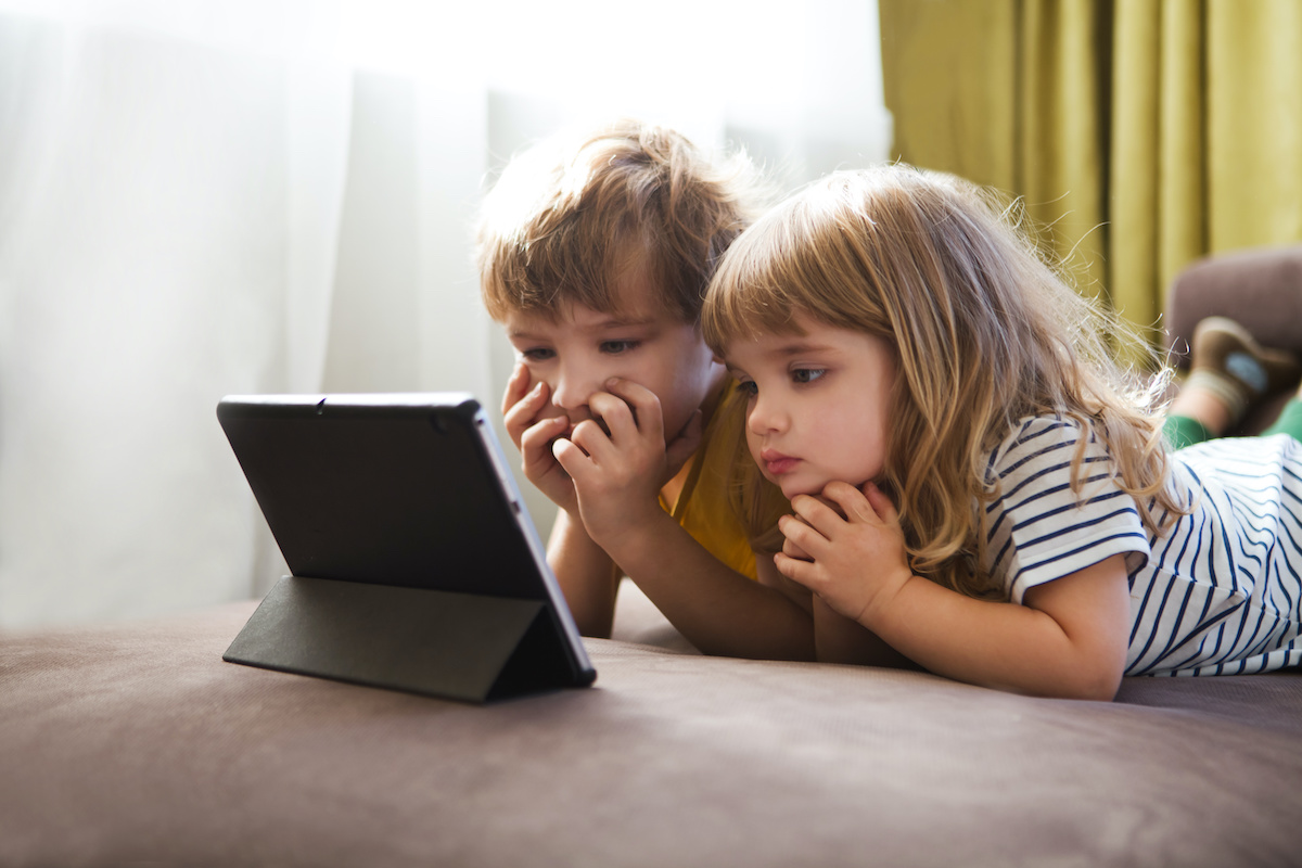 kids in front of ipad