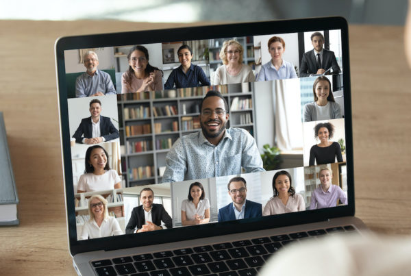 Female employee talk on video call with colleagues