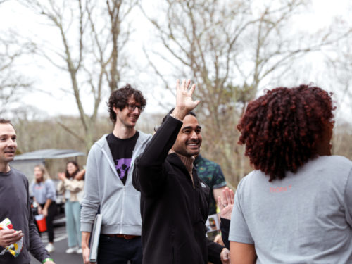 An employee volunteering during a group activity.