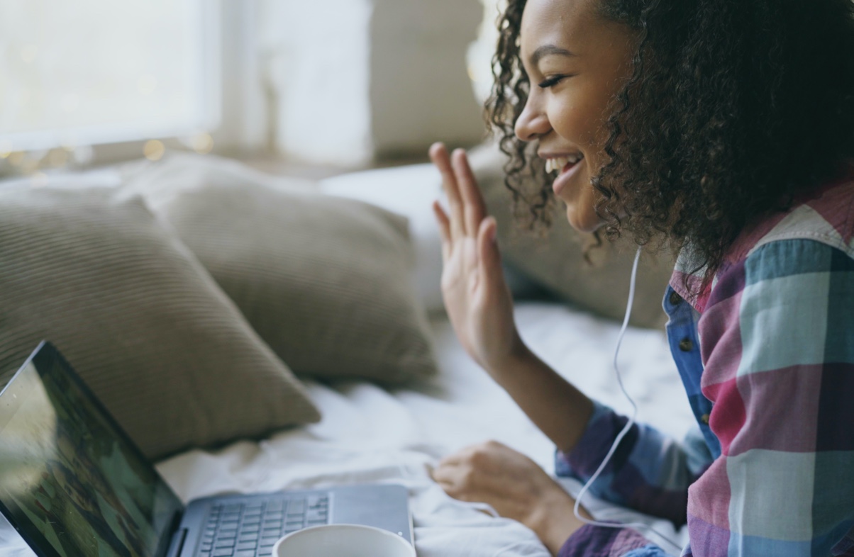 Woman working from home on a video chat